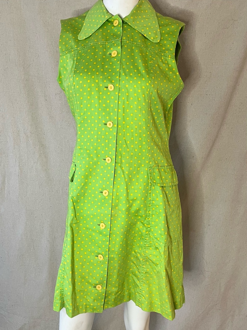 This Vintage Finnish Exclusion green and yellow polka dot dress in size medium